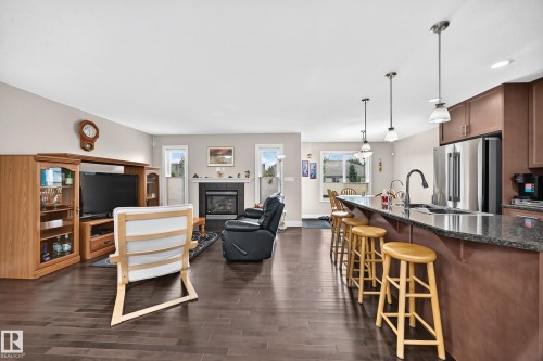 4904 214 Street Nw, Edmonton, AB - Indoor Photo Showing Kitchen With Fireplace With Upgraded Kitchen