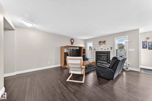 4904 214 Street Nw, Edmonton, AB - Indoor Photo Showing Living Room With Fireplace