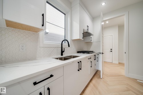 49 Norwyk Way, Spruce Grove, AB - Indoor Photo Showing Kitchen With Double Sink