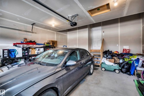 4930 Kinney Road Sw, Edmonton, AB - Indoor Photo Showing Garage