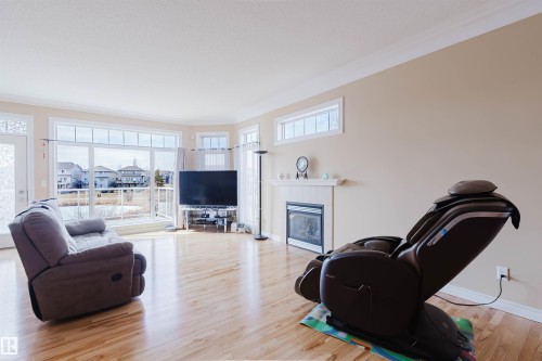 6604 Sandin Cove Nw, Edmonton, AB - Indoor Photo Showing Living Room With Fireplace