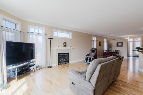 6604 Sandin Cove Nw, Edmonton, AB - Indoor Photo Showing Living Room With Fireplace