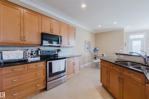 6604 Sandin Cove Nw, Edmonton, AB - Indoor Photo Showing Kitchen With Double Sink