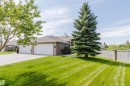 Expansive front lawn with mature trees - 6604 Sandin Cove Nw, Edmonton, AB  - Outdoor 