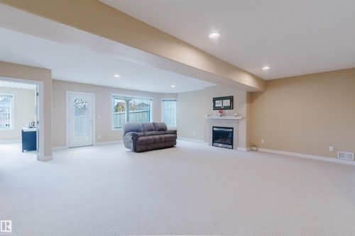 6604 Sandin Cove Nw, Edmonton, AB - Indoor With Fireplace
