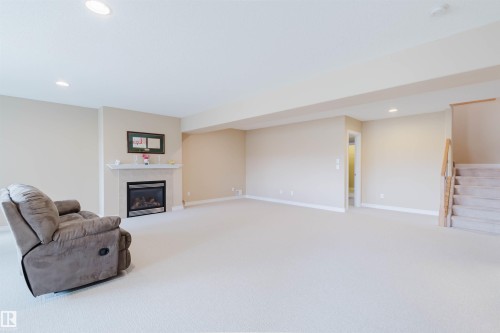 6604 Sandin Cove Nw, Edmonton, AB - Indoor With Fireplace