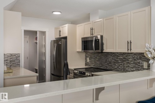 5112 1A Avenue Sw, Edmonton, AB - Indoor Photo Showing Kitchen With Stainless Steel Kitchen With Upgraded Kitchen