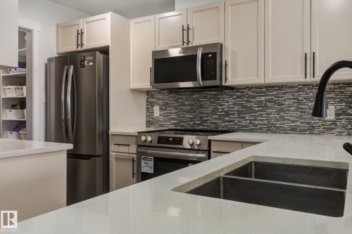 5112 1A Avenue Sw, Edmonton, AB - Indoor Photo Showing Kitchen With Stainless Steel Kitchen With Upgraded Kitchen