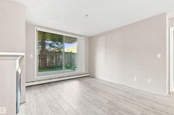 Light wood-finish flooring with a neutral wall color - 