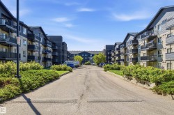Multi-story buildings with balconies and sloped roofs - 