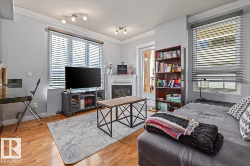 #704 9939 109 Street Nw, Edmonton, AB - Indoor With Fireplace