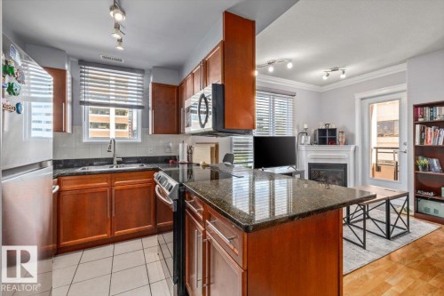 #704 9939 109 Street Nw, Edmonton, AB - Indoor Photo Showing Kitchen With Double Sink