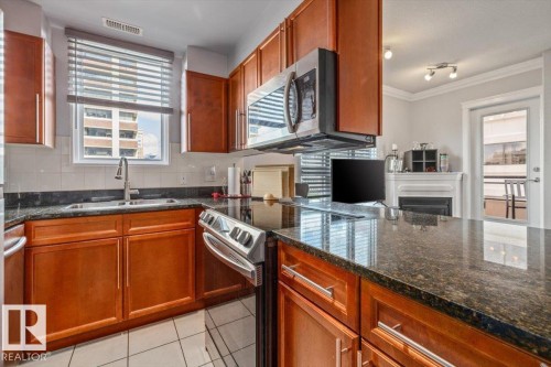 #704 9939 109 Street Nw, Edmonton, AB - Indoor Photo Showing Kitchen With Double Sink