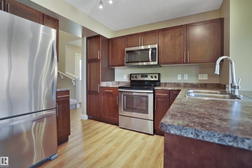 #33 445 Brintnell Bv Nw, Edmonton, AB - Indoor Photo Showing Kitchen With Double Sink