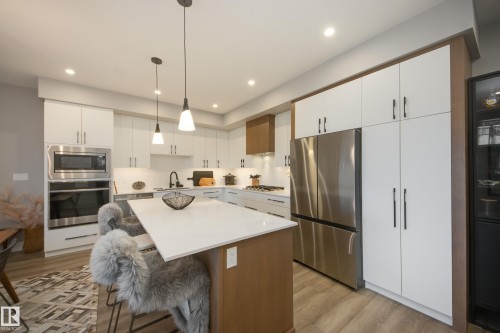 #312 7471 May Cm Nw, Edmonton, AB - Indoor Photo Showing Kitchen With Stainless Steel Kitchen With Upgraded Kitchen