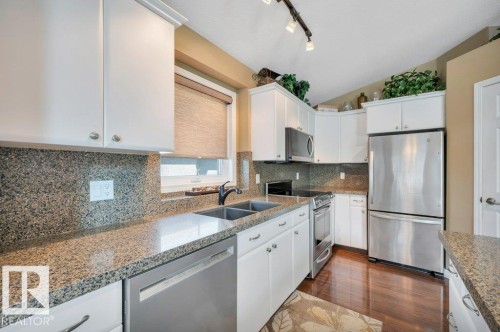 6909 159A Avenue Nw, Edmonton, AB - Indoor Photo Showing Kitchen With Double Sink