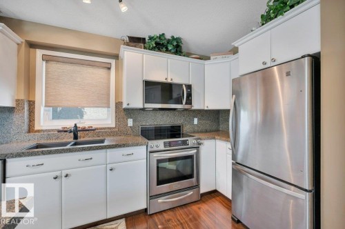 6909 159A Avenue Nw, Edmonton, AB - Indoor Photo Showing Kitchen With Double Sink