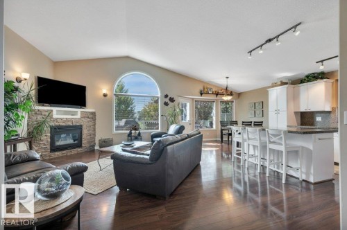 6909 159A Avenue Nw, Edmonton, AB - Indoor Photo Showing Living Room With Fireplace