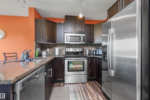 #146 5420 Grant Macewan Bv, Leduc, AB - Indoor Photo Showing Kitchen With Stainless Steel Kitchen With Double Sink