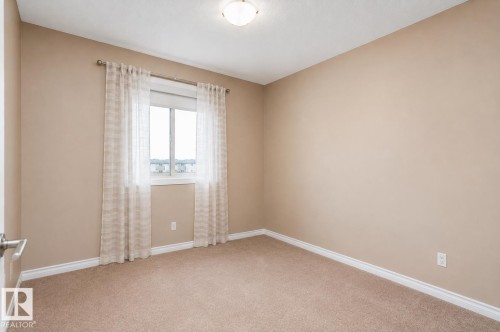 #146 5420 Grant Macewan Bv, Leduc, AB - Indoor Photo Showing Other Room