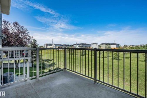 #146 5420 Grant Macewan Bv, Leduc, AB - Outdoor With Balcony