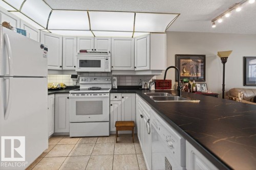 #112 6703 172 St Nw, Edmonton, AB - Indoor Photo Showing Kitchen With Double Sink