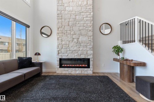 22328 88 Avenue Nw, Edmonton, AB - Indoor Photo Showing Living Room With Fireplace