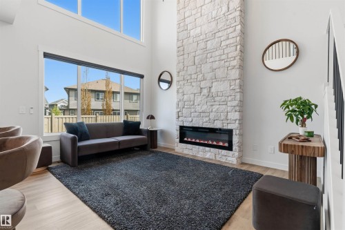 22328 88 Avenue Nw, Edmonton, AB - Indoor Photo Showing Living Room With Fireplace