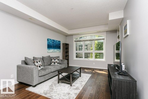 #209 10811 72 Av Nw, Edmonton, AB - Indoor Photo Showing Living Room