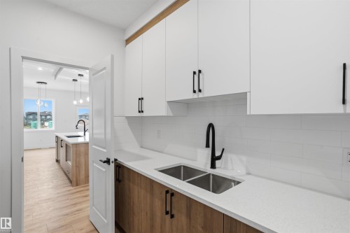 1798 Crossbill Loop Nw, Edmonton, AB - Indoor Photo Showing Kitchen With Double Sink
