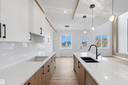 1798 Crossbill Loop Nw, Edmonton, AB - Indoor Photo Showing Kitchen With Double Sink With Upgraded Kitchen