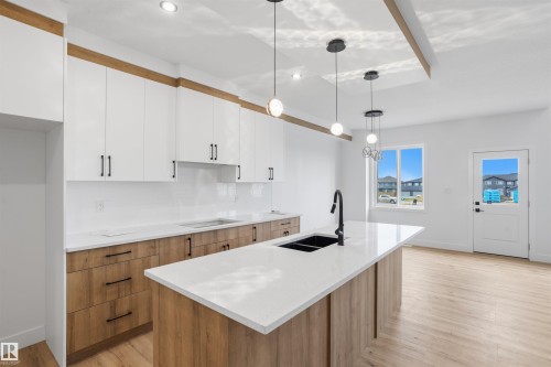 1798 Crossbill Loop Nw, Edmonton, AB - Indoor Photo Showing Kitchen With Double Sink With Upgraded Kitchen