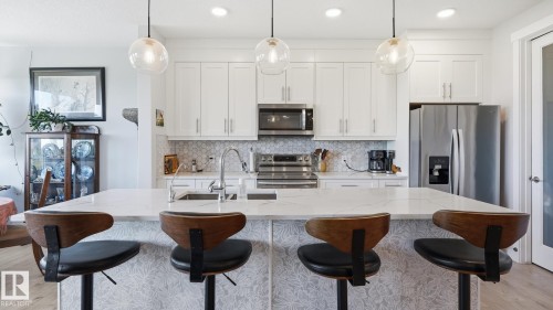 142 Aston Bend, Leduc, AB - Indoor Photo Showing Kitchen With Upgraded Kitchen