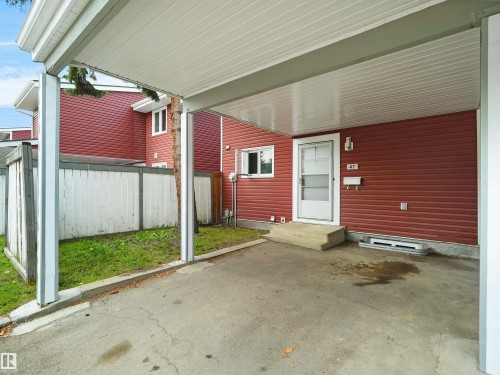 Covered carport with concrete flooring - #47 1904 48 St Nw, Edmonton, AB - Outdoor With Exterior