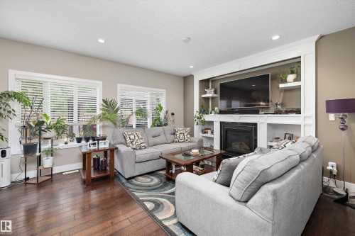 967 175 Street Sw, Edmonton, AB - Indoor Photo Showing Living Room With Fireplace