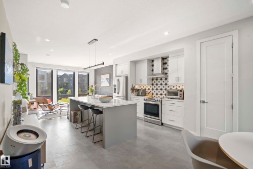 #16 1304 Rutherford Rd Sw, Edmonton, AB - Indoor Photo Showing Kitchen With Upgraded Kitchen