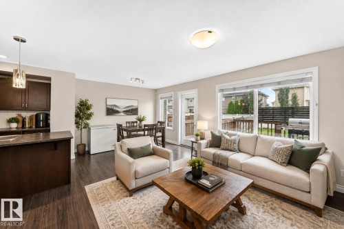 AI Staged - 258 Sturtz Bend, Leduc, AB - Indoor Photo Showing Living Room