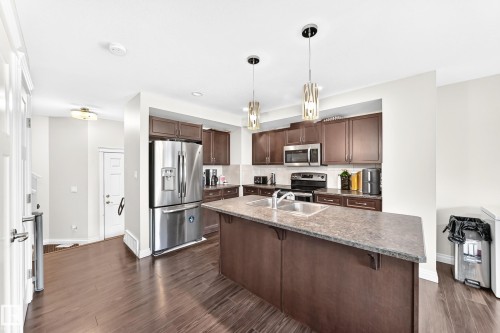 258 Sturtz Bend, Leduc, AB - Indoor Photo Showing Kitchen With Double Sink With Upgraded Kitchen