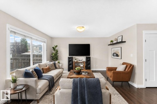 AI Staged - 258 Sturtz Bend, Leduc, AB - Indoor Photo Showing Living Room