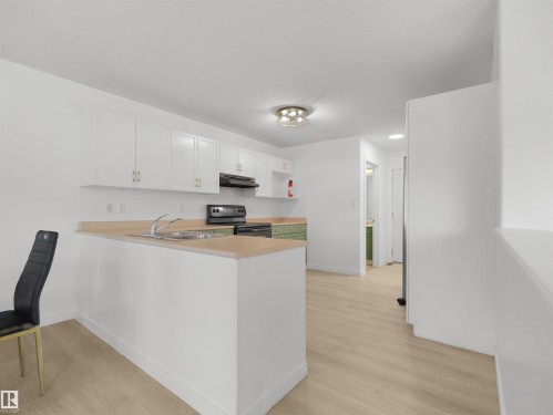 4808 34 Ave, Beaumont, AB - Indoor Photo Showing Kitchen With Double Sink