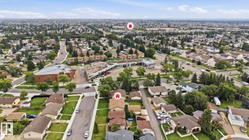 Aerial perspective showcasing established neighborhood with mature trees - 10007 168 Avenue Nw, Edmonton, AB - Outdoor With View
