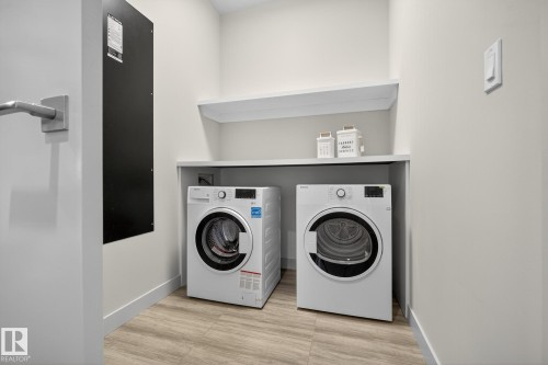 #4704 10360 102 St Nw, Edmonton, AB - Indoor Photo Showing Laundry Room