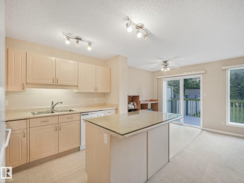 1142 Barnes Way Sw, Edmonton, AB - Indoor Photo Showing Kitchen With Double Sink