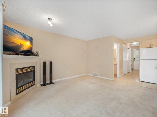1142 Barnes Way Sw, Edmonton, AB - Indoor With Fireplace