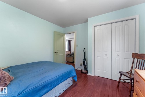 Wood flooring , closet and good size window for natural light. Take in  the view of your forest outside your windowsill, embrace the peace fullness with a westward breeze. - 2, 59031 Range Rd 232, Rural Thorhild County, AB - Indoor Photo Showing Bedroom