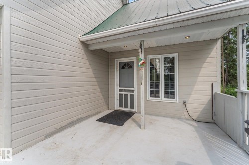 entry to kitchen area on main floor off upper deck - 2, 59031 Range Rd 232, Rural Thorhild County, AB - Outdoor With Deck Patio Veranda With Exterior