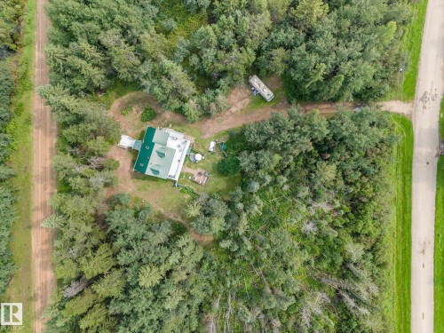 Expansive treed lot featuring a residence baking on to lane that border many quarters of crownland - 2, 59031 Range Rd 232, Rural Thorhild County, AB - Outdoor With View