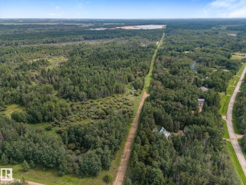 Expansive forested landscape featuring scattered residential structures and an unpaved road - 2, 59031 Range Rd 232, Rural Thorhild County, AB - Outdoor With View