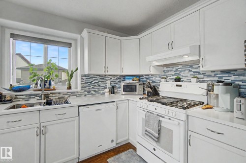 15727 141 Street Nw, Edmonton, AB - Indoor Photo Showing Kitchen With Upgraded Kitchen