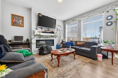 2317 158A Street Sw, Edmonton, AB - Indoor Photo Showing Living Room With Fireplace